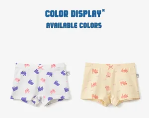 Detail of girls' cotton boxer briefs featuring rabbit and cat prints with pink bows