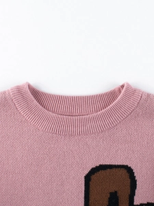 Suéter de punto rosa para niña con cuello redondo acanalado y patrón gráfico de dibujos