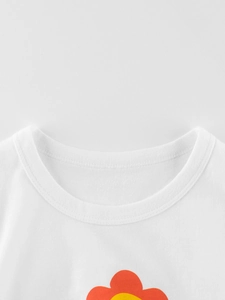 T-shirt blanc en coton pour filles avec imprimé tournesol et col rond côtelé élégant