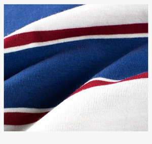 Close-up of premium knit striped fabric in blue, white and red for kids t-shirts