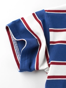 Close-up of kids' striped short-sleeve T-shirt featuring blue, white and red knit patterns