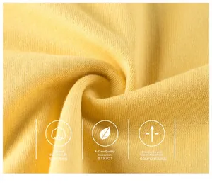 Macro detail of soft yellow knitted cotton fabric for kids T-shirt with breathable texture