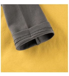 Macro detail of high-quality cotton knit cuff with durable double-needle stitching