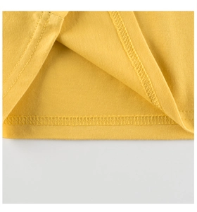 Detail of yellow cotton long-sleeve T-shirt showing high-quality double-needle hem stitching