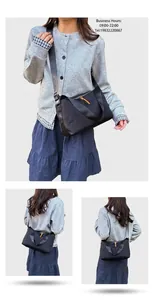 Détails de la bandoulière en nylon noir avec sangle réglable et tirette en cuir
