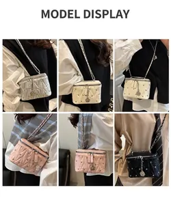 Quilted box shoulder bag in four colors with rose pendant and elegant chain strap details