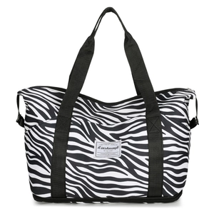 Large capacity zebra print travel tote bag with durable handles and bottom shoe compartment