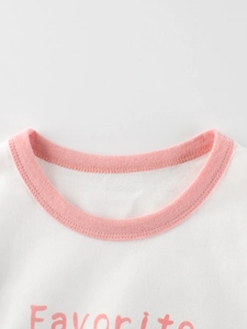 T-shirt à manches longues en coton blanc pour enfant avec col rose et imprimé