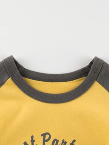 Kids long sleeve cotton t-shirt with yellow body and dark grey raglan sleeves