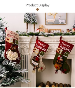 Detailed view of 3D Santa, Snowman and Reindeer stockings on a cozy fireplace mantle