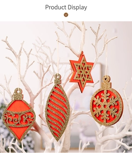 Set of 4 red and gold wooden Christmas ornaments in star, flake, and geometric shapes