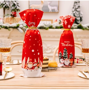Detailed close-up of festive red Christmas wine bottle covers with Santa and deer motifs