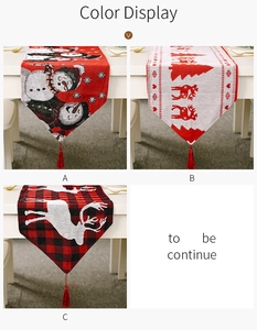 Details von drei Weihnachts-Tischläufern mit Rentier-Motiven und roten Quasten für Tische