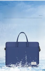 Waterproof detail of navy blue oxford fabric laptop bag with splash resistance demonstration