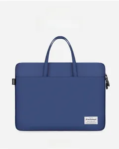 Close-up of a blue laptop sleeve with durable fabric and reinforced double handles