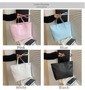 Color options of large woven tote bag in pink, blue, white, and black shown in a grid