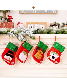 Close-up of four Christmas stockings with sequins and 3D festive characters on a fireplace