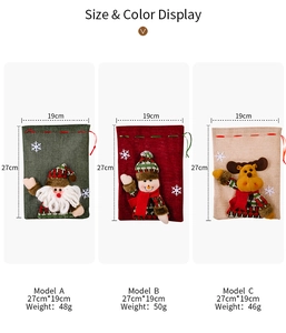 Detailed view of burlap Christmas drawstring gift bags with plush Santa, Snowman and Elk