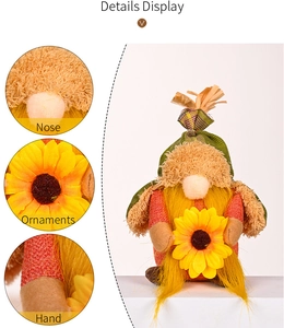 Detailed view of sunflower autumn gnome ornaments showing nose and hand fabric textures