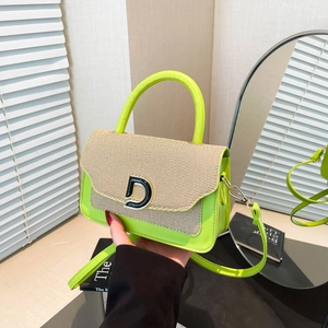 Vintage style handbag with neon green leather and beige woven flap featuring D-buckle