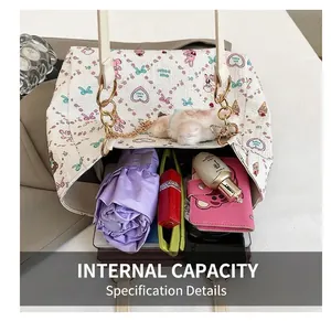 Detail view of cartoon tote bag interior showing large capacity for umbrella and phone