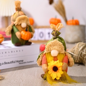 Fall Harvest Gnomes with sunflowers and pumpkins for autumn holiday home decoration