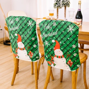 Christmas chair covers with green plaid snowman and Feliz Navidad text for dining decor