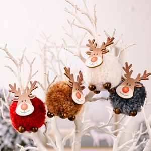 Set of four plush pom-pom reindeer ornaments in red, camel, white, and grey for Christmas trees