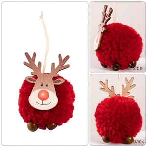 Large plush pom-pom reindeer ornament for Christmas tree decor with wooden details