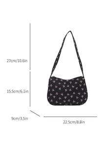Sac bandoulière noir avec motif nœuds roses et dimensions de taille 22,5cm x 15,5cm x 9cm