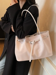 Large French style pale pink tote bag with woven texture and long shoulder handles