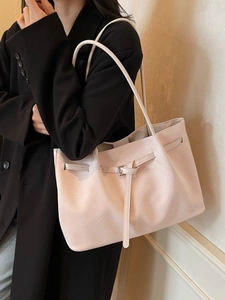 Large pale pink tote bag with textured finish and silver buckle for autumn fashion