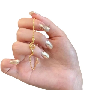 Elegant gold snake wrap bracelet with detailed engraving and fine metal chain design