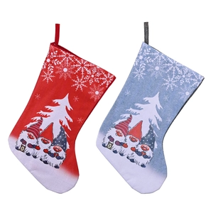 Set of two Christmas stockings with gnome and snowflake prints in red and blue colors