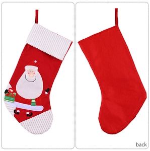 Front and back view of a red plush Santa Claus Christmas stocking with knit white details