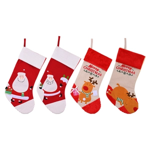 Set of 4 Christmas stockings with Santa and reindeer motifs for holiday decorations
