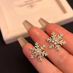 Snowflake Stud Earrings Copper Gold Plated With Sparkling Cubic Zirconia Elegant Winter Fashion Jewelry For Women