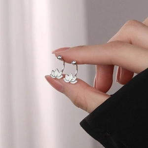 Elegant silver lotus flower stud earrings with S-hook design and sparkling frosted finish