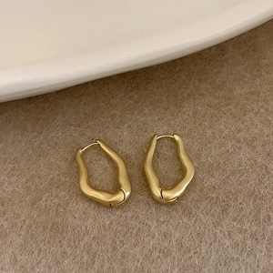 Minimalist irregular geometric gold hoop earrings with matte wave texture for women