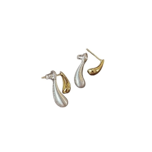 Two-tone water drop earrings with matte silver and glossy gold finish in modern design
