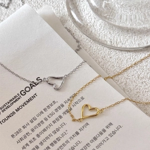Collane minimaliste con pendenti a cuore in oro e argento e zircone su catena sottile