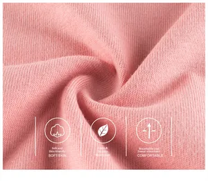 Close-up of pink ribbed knit fabric showing soft texture and breathable cotton quality