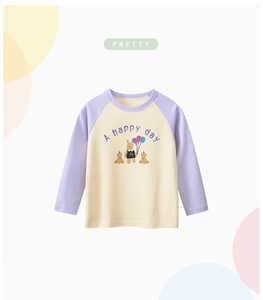 Detail of raglan sleeves and cute cartoon bear print on long sleeve cotton T-shirt
