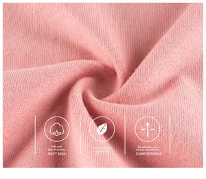 Gros plan du tissu en coton rose doux de qualité Classe A avec texture respirante