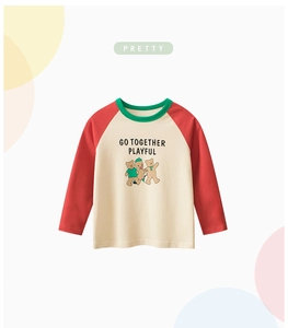 Detailed view of kids raglan t-shirt featuring three cartoon bears and playful text