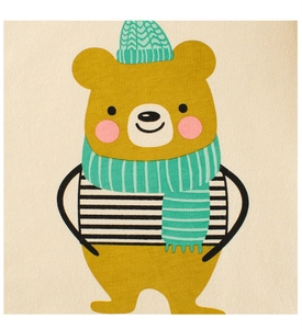Close-up of cute cartoon bear with striped scarf printed on beige cotton kids t-shirt