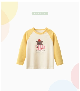Detail of kids raglan sleeve t-shirt with cute bear in teacup print and soft cotton fabric
