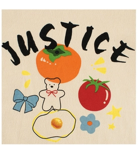Detail of girls' cotton long sleeve tee featuring cute cartoon graphics and Justice text