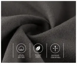 Macro detail of breathable charcoal gray knit fabric with soft texture for kids clothing