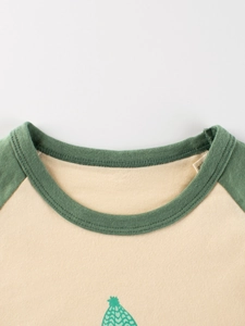 Kids long sleeve raglan T-shirt with green crew neck and cute bear print on cream cotton